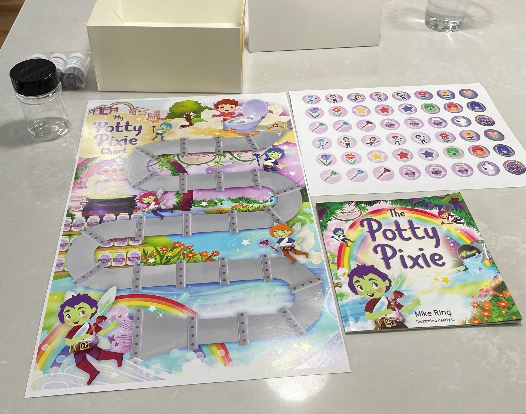 Parent setting up potty seat and potty training chart.